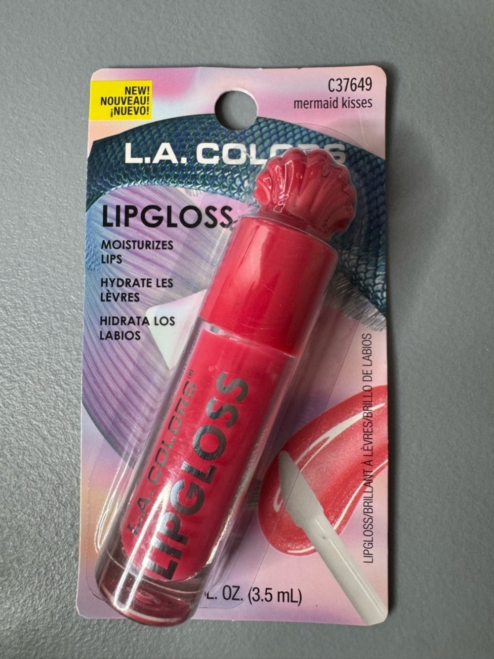 L.A. Colors seashell shaped Lip Gloss in mermaid kisses coral red shimmer beach